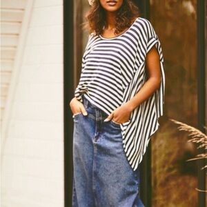 So cool in stripes, this timeless tee is featured in a drapey, relaxed fit.